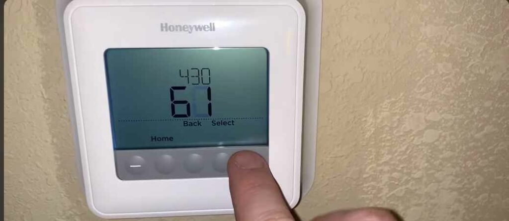 Honeywell thermostat says wait after changing batteries