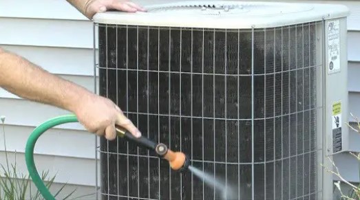 Should I Spray My AC Unit With Water? The Dos and Don’ts