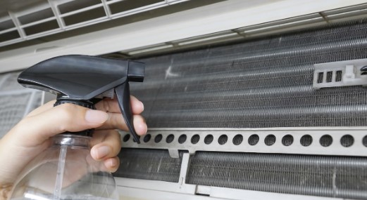 Spraying Water on Air Conditioner’s Condenser While Running